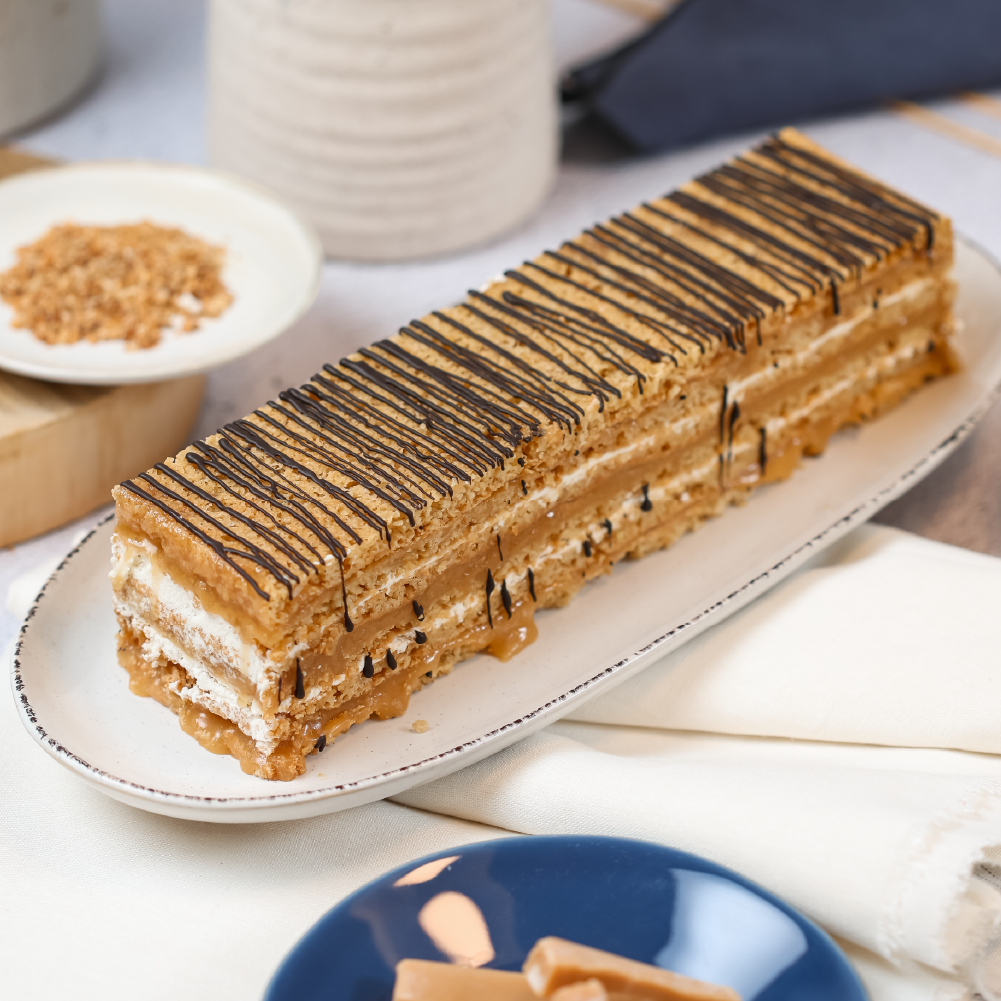 Barra de caluga butterscotch con galleta de avena y crema, formato para 15 personas